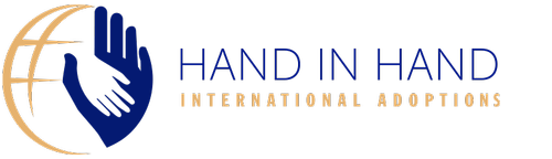 Hand in Hand International Adoption Logo with a hand in another hand in the shape of a globe