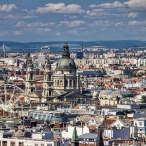 Aerial view of Budapest, Hungary, featuring St. Stephen's Basilica dome amid the city skyline
